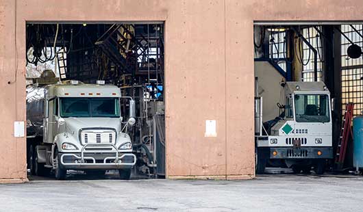 Terminal Tractors vs. Conventional Trucks: Which is Best for Port Operations?